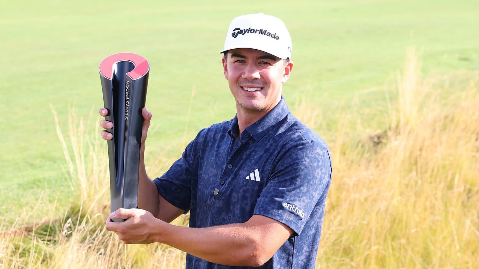 Michael Thorbjornsen lifting the Rocket Classic trophy.