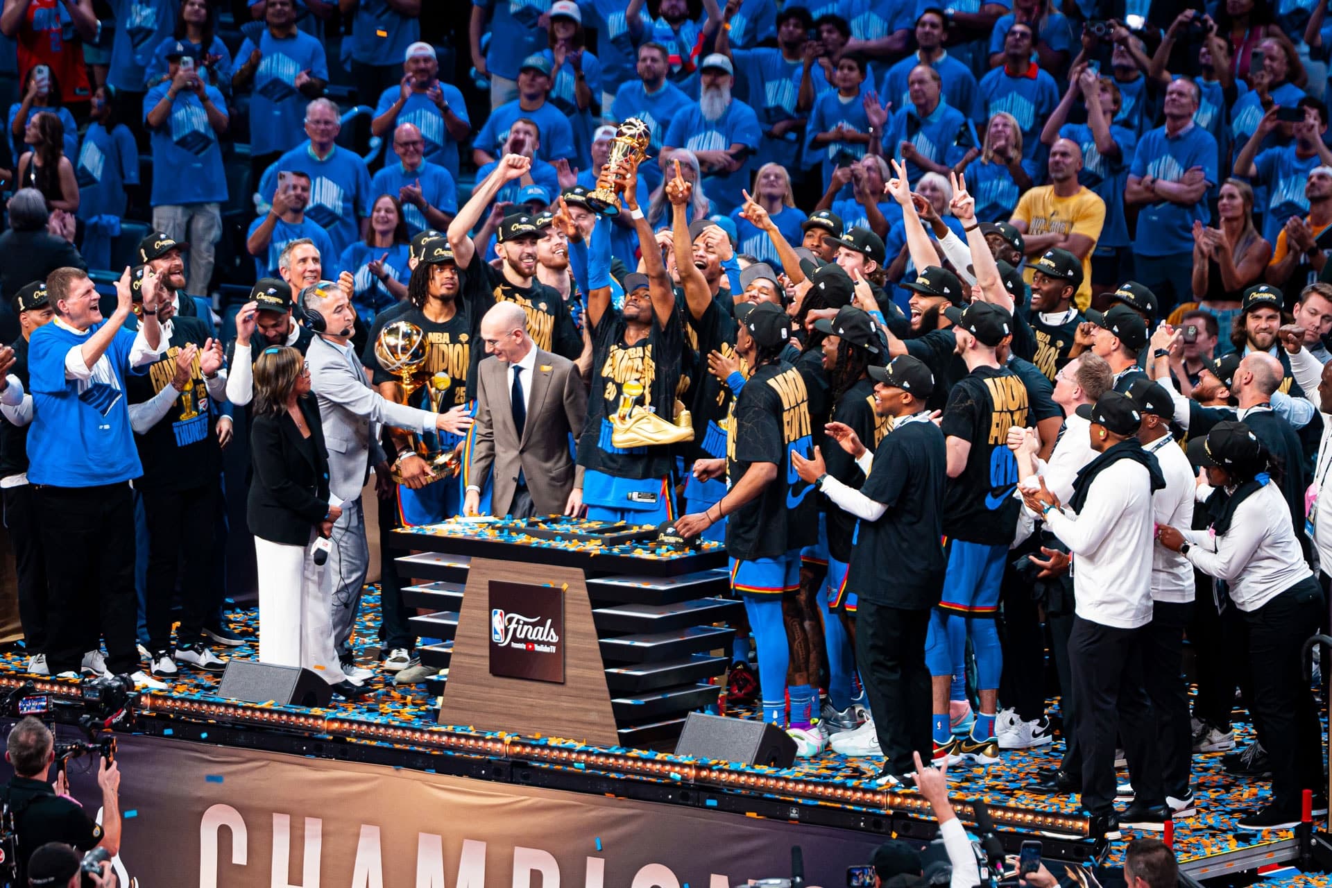 Shai Gilgeous-Alexander in a white Oklahoma City Thunder jersey, number 2, driving baseline in Game 7 of the 2025 NBA Finals.