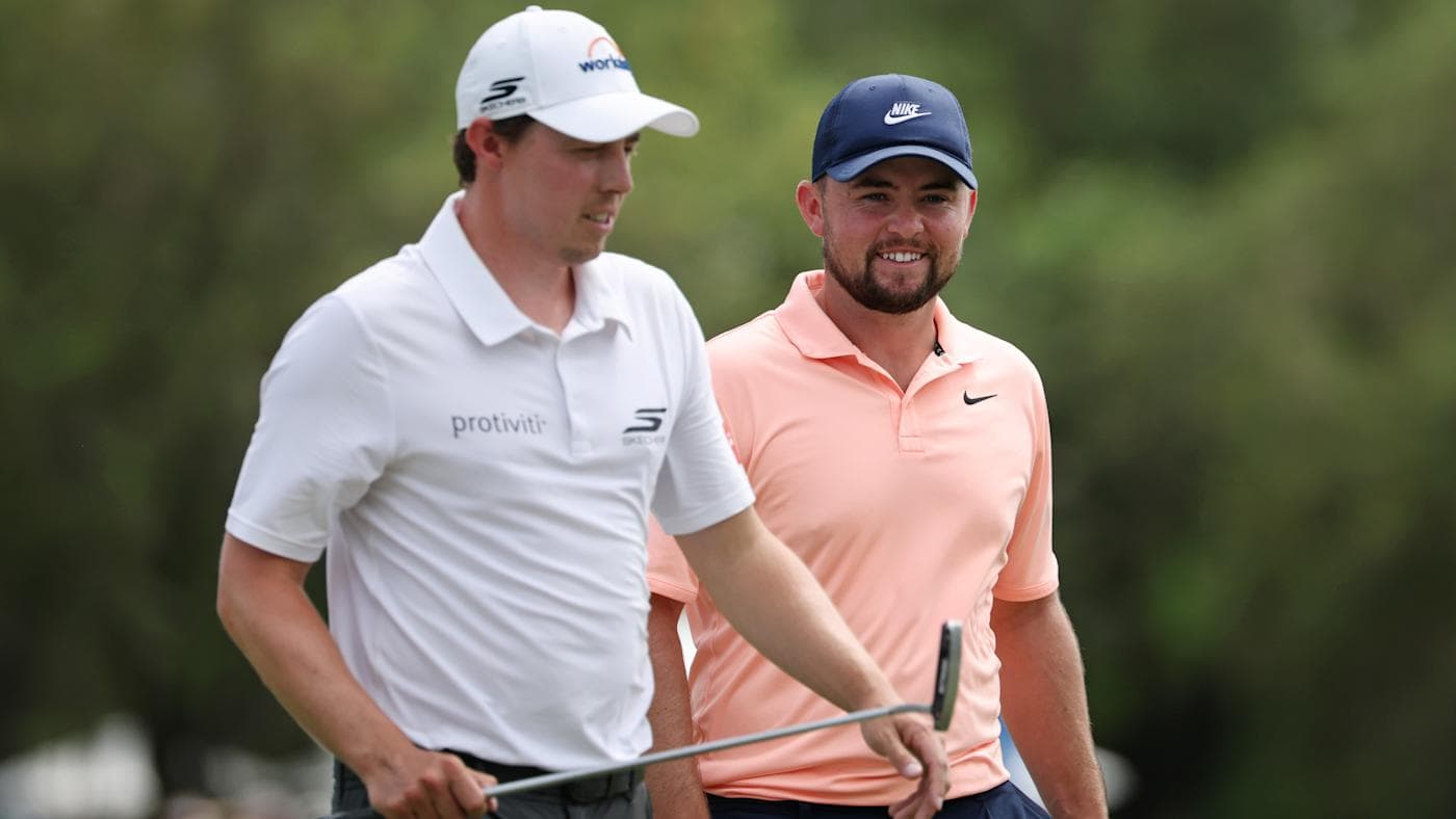Matt Fitzpatrick and Alex Fitzpatrick embracing on the green at the 2026 Zurich Classic.
